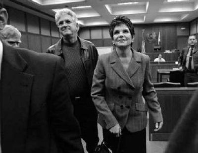 
Former Hewlett-Packard Chairwoman Patricia Dunn, right, and her husband, Bill Jahnke, left, leave a San Jose, Calif., courtroom, last fall. A judge dropped the charges Wednesday against Dunn, who was accused of orchestrating the company's boardroom spying scandal. 
 (Associated Press / The Spokesman-Review)