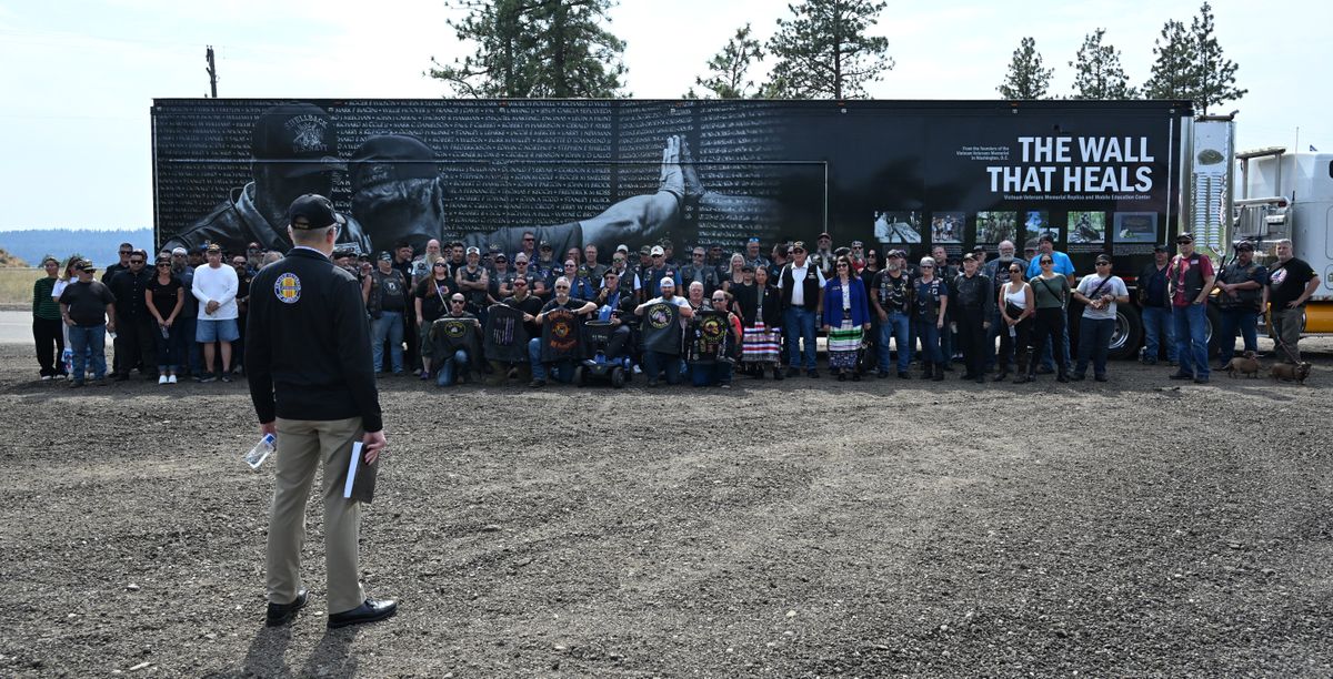 Vietnam veteran Stan Inzer speaks to the crowd of drivers who helped escort the truck carrying the replica of the Vietnam Memorial wall into Spokane with dozens of vehicles and law enforcement Tuesday, Aug. 26, 2025. The display of the wall will open Thursday, Aug. 28 at Dwight Merkel Sports Complex in north Spokane.  (Jesse Tinsley/THE SPOKESMAN-REVI)