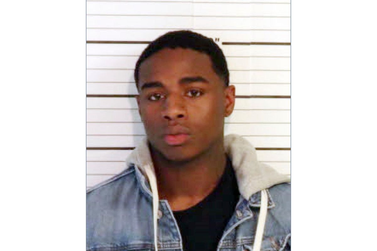 This image released by the U.S. Marshals Service shows Justin Johnson. An arrest warrant has been issued for Johnson, 23, in connection with the the Nov. 17, 2021, shooting fatal shooting of rapper Young Dolph, who was gunned down in a daylight ambush at a popular cookie shop in November in his hometown of Memphis, authorities said Wednesday, Jan. 5, 2022.  (HOGP)