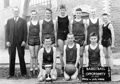 
This photo features the eighth-grade basketball team of Opportunity, Wash., during its 1946-47 season. Pictured, standing from left, are Coach Phil Coble, Marlin Muse, Jerry Ramey, Rich Woolard, Chuck Pederson, Lyle Abbott and Danny Wheldon; front from left, Don Borden, Jim Zopfi and Len Pederson. 
 (Photo courtesy of Len Pederson / The Spokesman-Review)