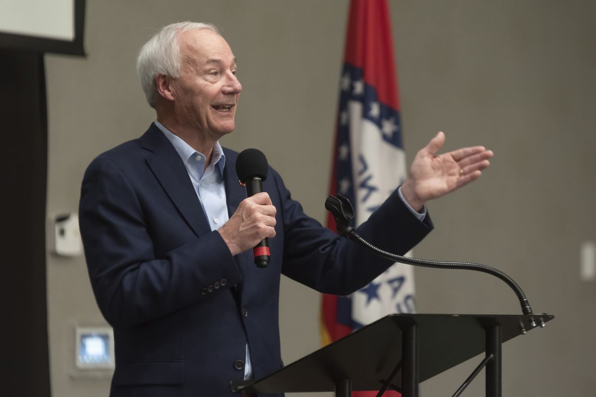 FILE - In this July 15, 2021, file photo, Arkansas Gov. Asa Hutchinson speaks during a town hall meeting in Texarkana, Ark. Facing growing vaccine hesitancy, governors in states hard hit by the coronavirus pandemic are asking federal regulators to grant full approval to the shots in the hope that will persuade more people to get them. The governors of Arkansas and Ohio have appealed in recent days for full approval as virus cases and hospitalizations skyrocket in their states.  (Kelsi Brinkmeyer)