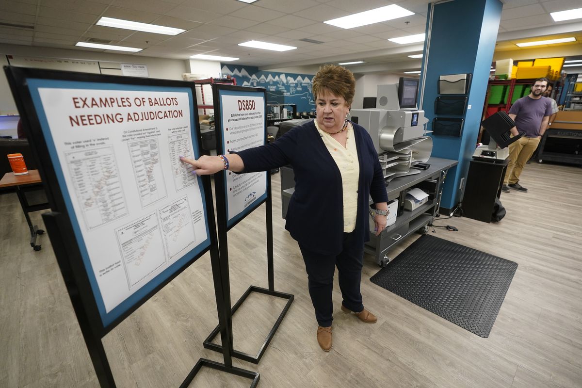 Utah County elections director Rozan Mitchell conducts a tour of Utah County's elections equipment and review our processes for administering secure elections Tuesday, April 19, 2022, in Provo, Utah. In Utah and other Republican-led states, unsubstantiated election fraud claims have upended support for vote by-mail, a practice that not long ago was overwhelmingly popular among Republicans.  (Rick Bowmer)