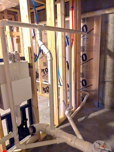 You normally never see the pipes that carry wastewater away from a bathroom. This is a rare instance of a basement bathroom where the sewer line exits the house about 7 inches above the concrete floor.  (Tribune Content Agency)