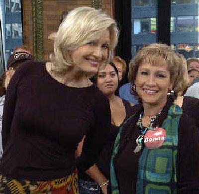 
Diane Sawyer poses with Donna Deshon of Sandpoint, the winner of a 