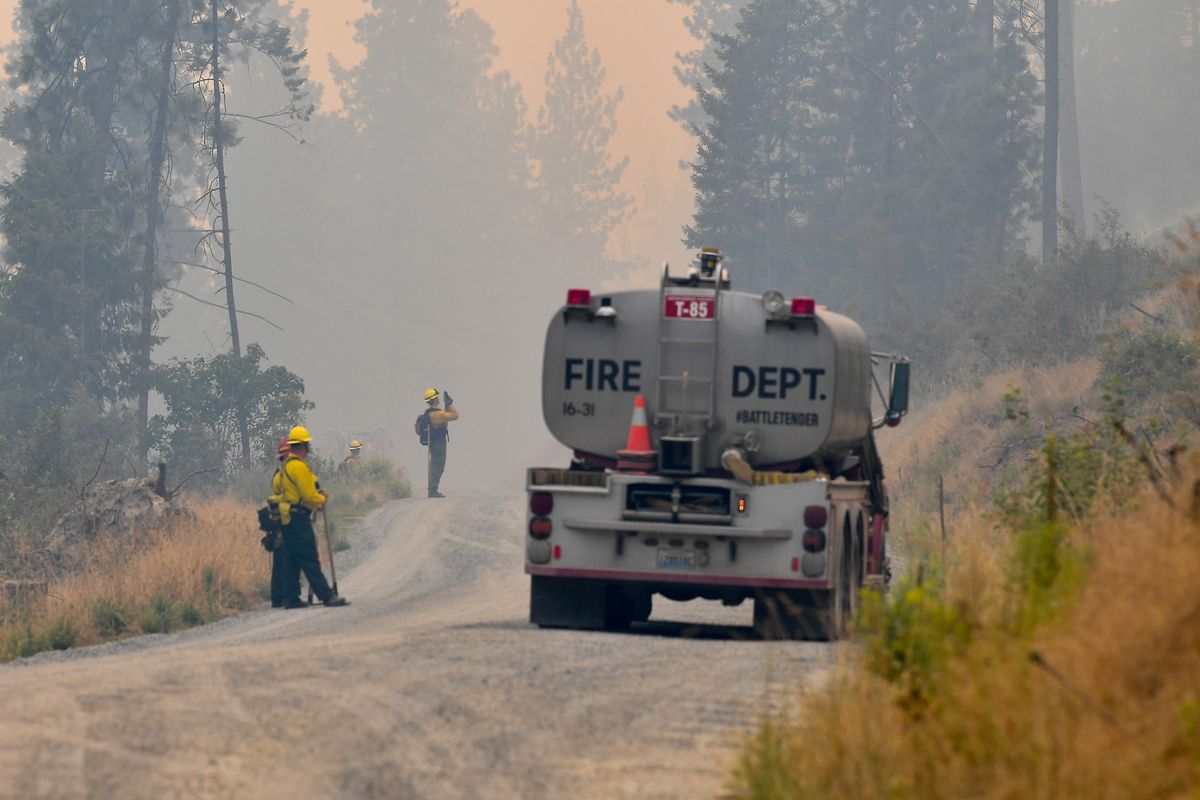 Crews battle the Ford Corkscrew Fire on Tuesday, Aug. 17, 2021, near Tum Tum, Wash.  (Tyler Tjomsland/The Spokesman-Review)