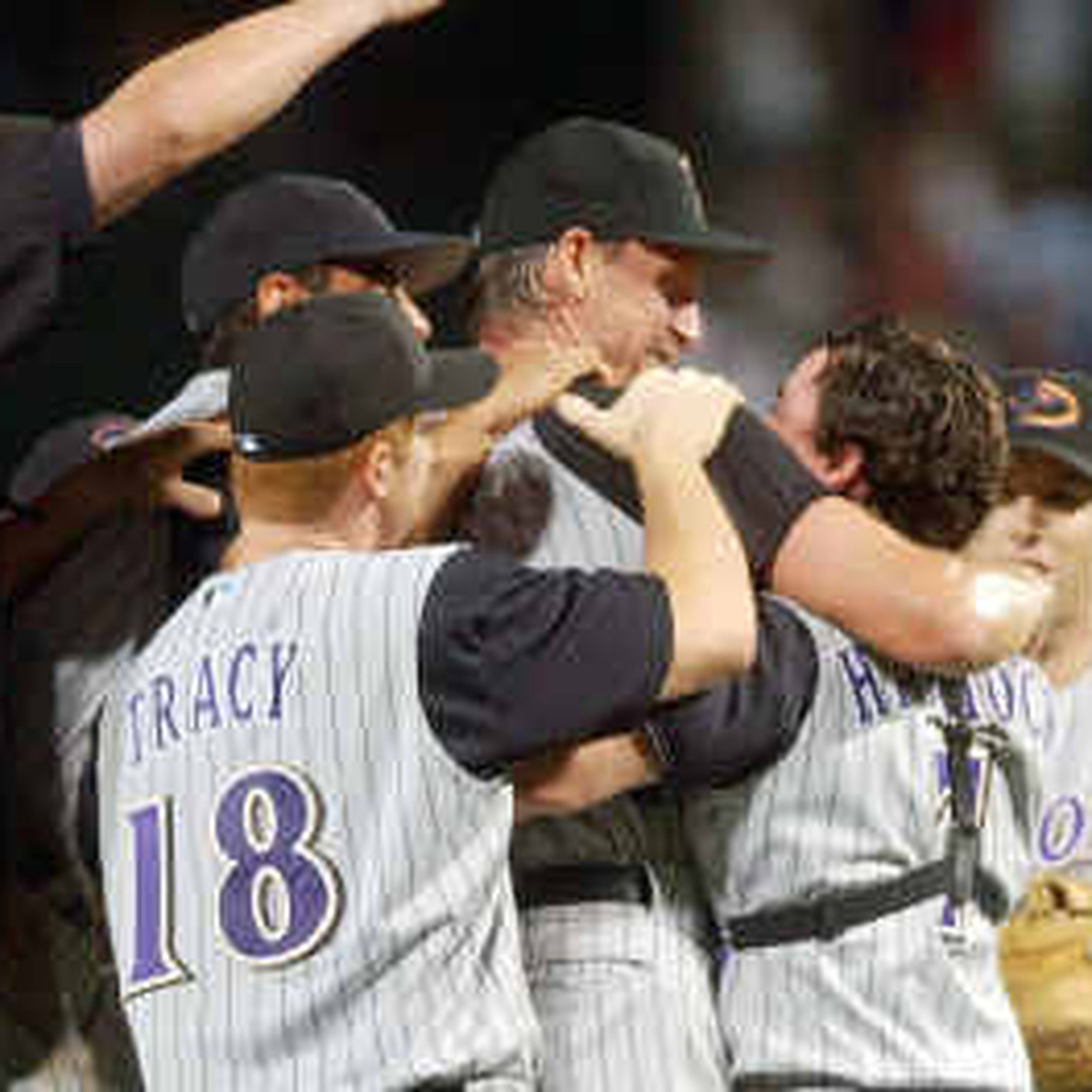 Arizona Diamondbacks starter Curt Schilling, right, is