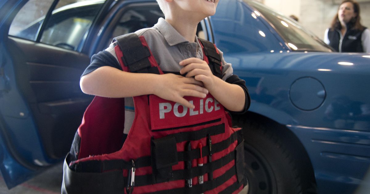 Spokane police firefighters helping kids with autism get comfortable