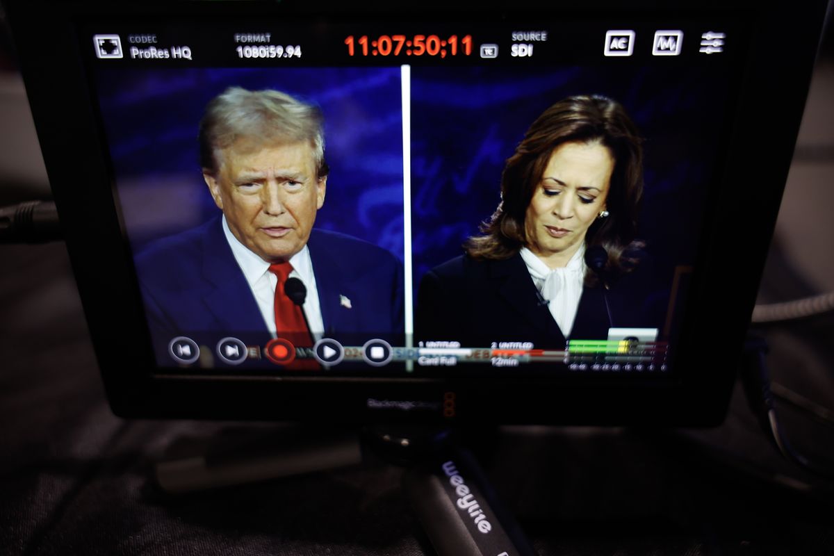 PHILADELPHIA, PENNSYLVANIA - SEPTEMBER 10: Republican presidential nominee, former U.S. President Donald Trump and Democratic presidential nominee, U.S. Vice President Kamala Harris are seen on a screen as they debate for the first time during the presidential election campaign at The National Constitution Center on September 10, 2024 in Philadelphia, Pennsylvania. After earning the Democratic Party nomination following President Joe Biden