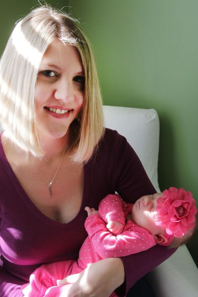 Kayla Taylor, 27, holds her baby girl, Sophia, who she gave birth to on Nov. 10, in their family's Ypsilanti home on Nov. 30, 2015. Instead of the epidural or nothing at all she was given the option of using laughing gas. She said when she was offered the Nitrogen Oxide she thought, 