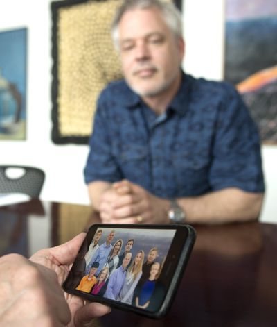 Dean Davis, a photographer in Spokane, found his biological father – and family – after more than 30 years of searching. (Jesse Tinsley / The Spokesman-Review)