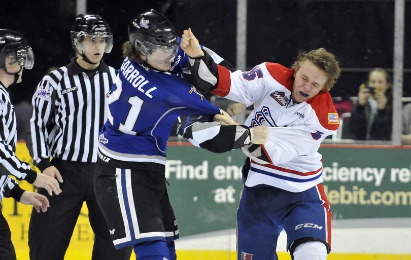 The Spokane Chiefs' Carter Proft, right, throws a punch at Austin Carroll of the Victoria Royals in a fight Sunday, Feb. 10, 2013 at the Spokane Arena.  Each fighter got five minutes. The Chiefs battled, but came up short 5-3 against the Royals. (Jesse Tinsley / The Spokesman-Review)