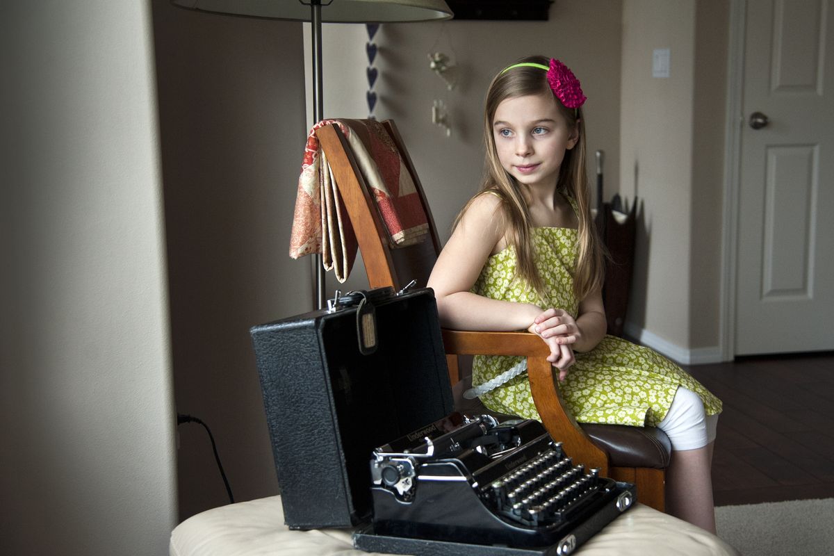 Sofie Boures, 7, wanted a typewriter for Christmas. Her parents were able to find, at a local thrift shop, a 1938 machine that once belonged to Spokesman-Review reporter Dorothy Powers. (Dan Pelle)