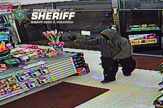 Police looking for convenience store robber caught on tape