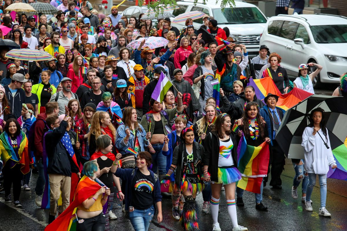 The bulk of the crowd that attended the 2018 Pride Parade follows the specific groups that were leading the event on June 9, 2018. (Libby Kamrowski / The Spokesman-Review)