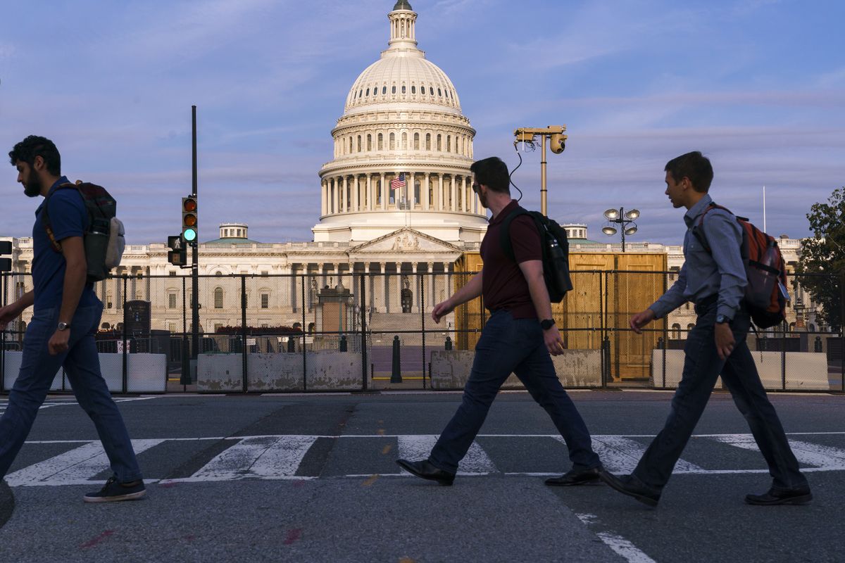 Security fencing has been reinstalled around the Capitol in Washington, Thursday, Sept. 16, 2021, ahead of a planned Sept. 18 rally by far-right supporters of former President Donald Trump who are demanding the release of rioters arrested in connection with the 6 January insurrection.  (J. Scott Applewhite)