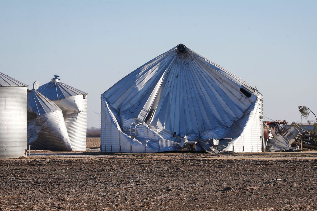 Damage to a grain bin is seen in Greene County, Iowa, on Thursday, Dec. 16, 2021, after a band of severe weather produced strong wind gusts and reports of tornadoes across much of the state Wednesday night. The storm caused property damage and downed power lines, leaving many Iowans without electricity.  (Bryon Houlgrave)