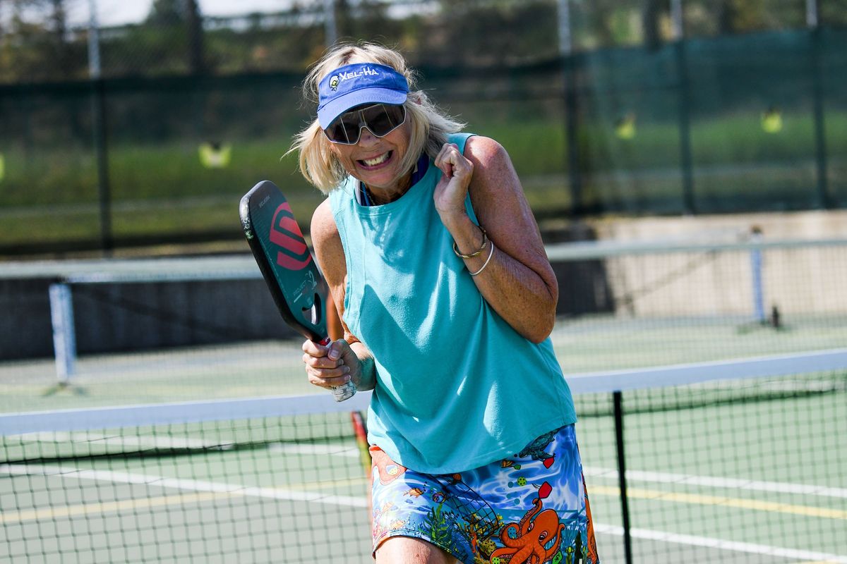 Meg Morgan celebrates a good hit while playing pickleball at Cherry Hill Park in Coeur d