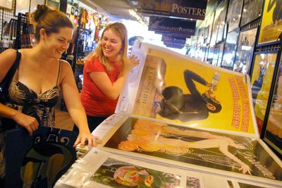 Stanford University roommates Eliza Fox, right, and Caitlin Crandell flip through the sleeves of posters in a store on South Street in Philadelphia, looking for posters for their dorm room walls. Posters are an easy way to bring personality to a room.McClatchy-Tribune (McClatchy-Tribune / The Spokesman-Review)