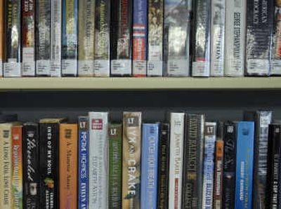 
The large print section at the Spokane Valley Library is packed tightly with books.
 (The Spokesman-Review)