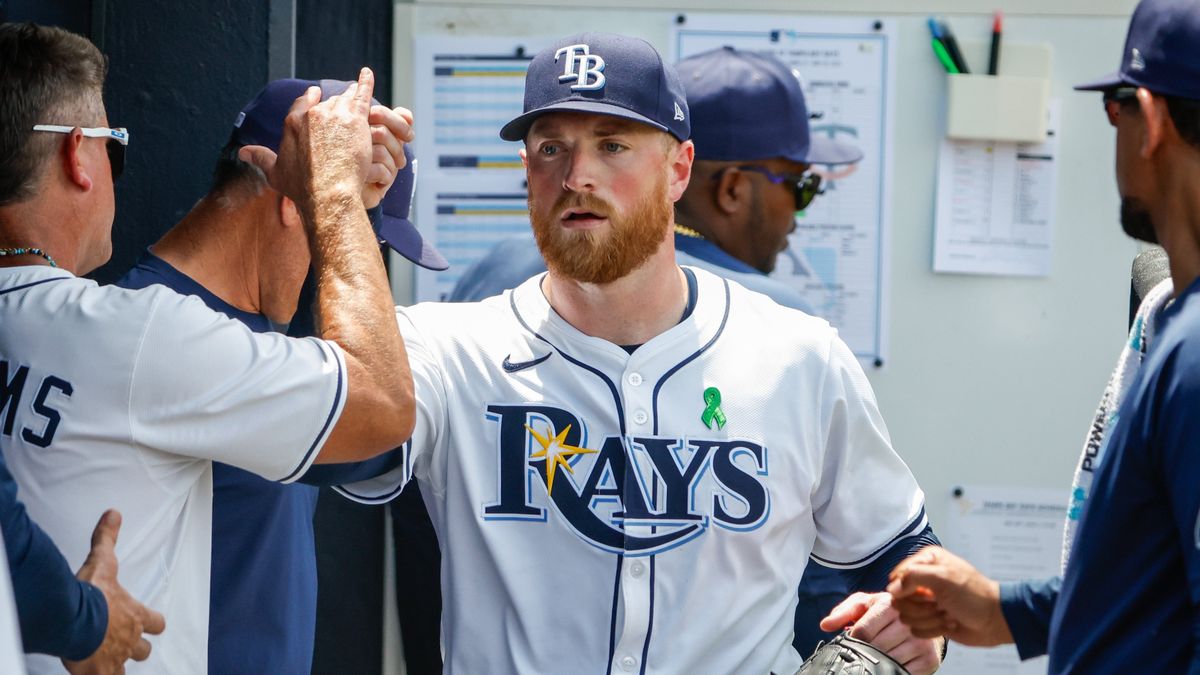 Drew Rasmussen receives fist-bumps from teammates in the Rays dugout after completing a six-inning start against the Twins last month at Steinbrenner Field. “He’s one of the best right-handed starters in the game,” pitching coach Kyle Snyder said. (Tribune News Service)