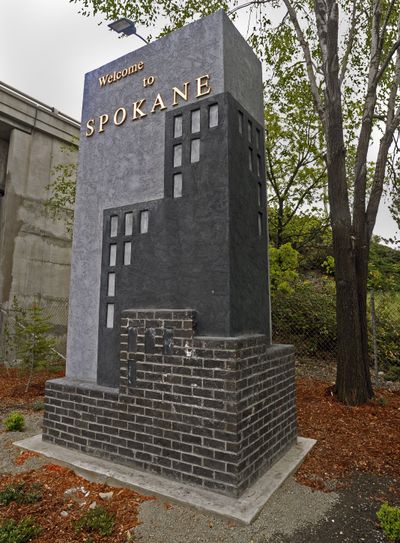 This monument welcoming people to Spokane stands at the intersection of Division Street and Fourth Avenue at Interstate 90. (Christopher Anderson)