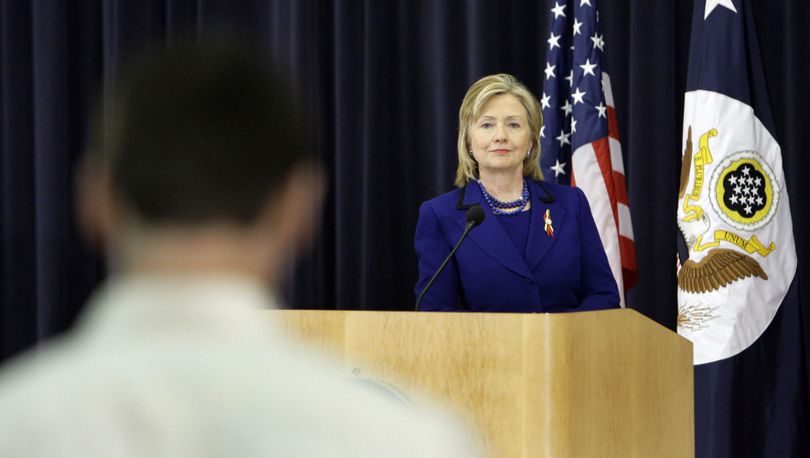 Secretary of State Hillary Rodham Clinton listens to a question during a town hall style meeting with employees marking her one year anniversary at the State Department, Tuesday, Jan. 26, 2010, at the State Department in Washington. (Alex Brandon / Associated Press)