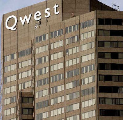 
 The Qwest Communications International Inc. tower is shown in Denver. Qwest could end up the target of an acquisition or have to stand on its own in the fast-consolidating telecommunications industry, according to analysts. 
 (Associated Press / The Spokesman-Review)