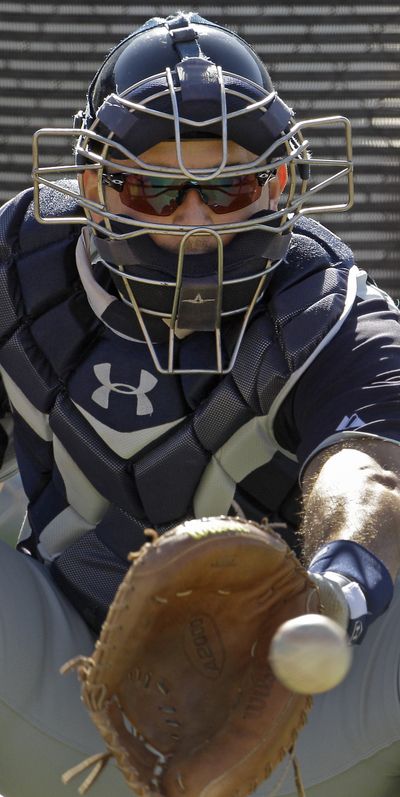 Initially, Jesus Montero will see more time as designated hitter than behind the plate as the Mariners’ catcher. (Associated Press)