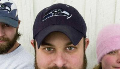 
Tim Fackenthall, president of the Spokane Sea Hawkers, shows his loyalty.  The group watches the games and meets monthly. 
 (Kathryn Stevens / The Spokesman-Review)