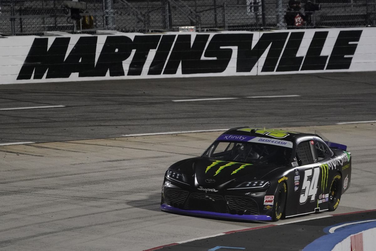 Ty Gibbs leads in Turn 4 after a restart in the NASCAR Xfinity Series auto race at Martinsville Speedway on Friday, April 8, 2022, in Martinsville, Va.  (Associated Press)