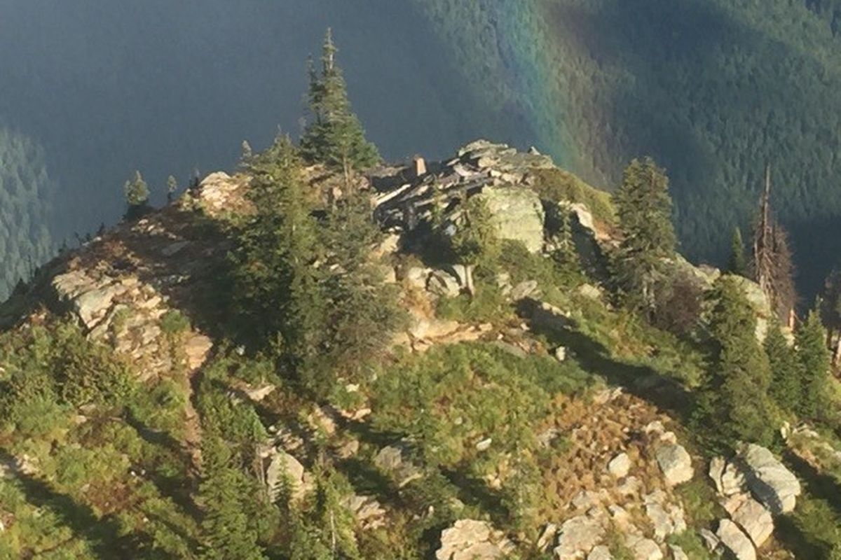 The fire lookout on Little Snowy Top Mountain burned to the ground on Sept. 3, 2016, as seen in this photo made by a North Idaho fire-fighting helicopter crew. The cause had not immediately been determined. The lookout in the Salmo-Priest Wilderness had been phased out of use for fire fighting in the 1960s and remained open for public use. Visitors had to hike or ride a horse at least 9 trail miles to reach the lookout. (Clinton Agidius)