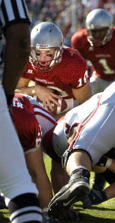
Washington State quarterback Alex Brink sneaks in from the 1-yard line for the Cougars' first score.
 (Christopher Anderson/ / The Spokesman-Review)
