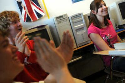 
Students in sophomore honors English at Gonzaga Prep congratulate Amanda Boik after an essay she wrote won the Spokane Community Observance of the Holocaust Creative Writing contest. 
 (RAJAH BOSE photos / The Spokesman-Review)