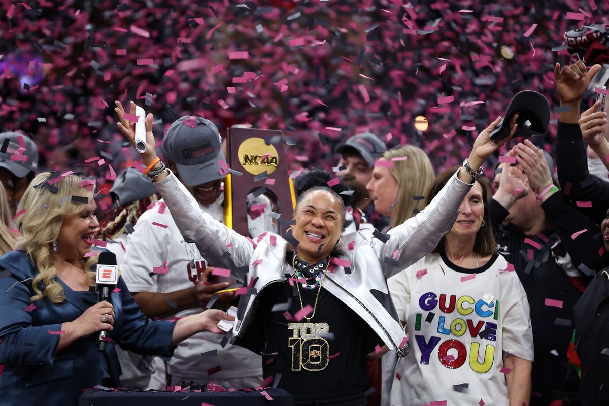 Head coach Dawn Staley of the South Carolina Gamecocks celebrates as the confetti falls after beating Iowa Hawkeyes in the 2024 NCAA Women