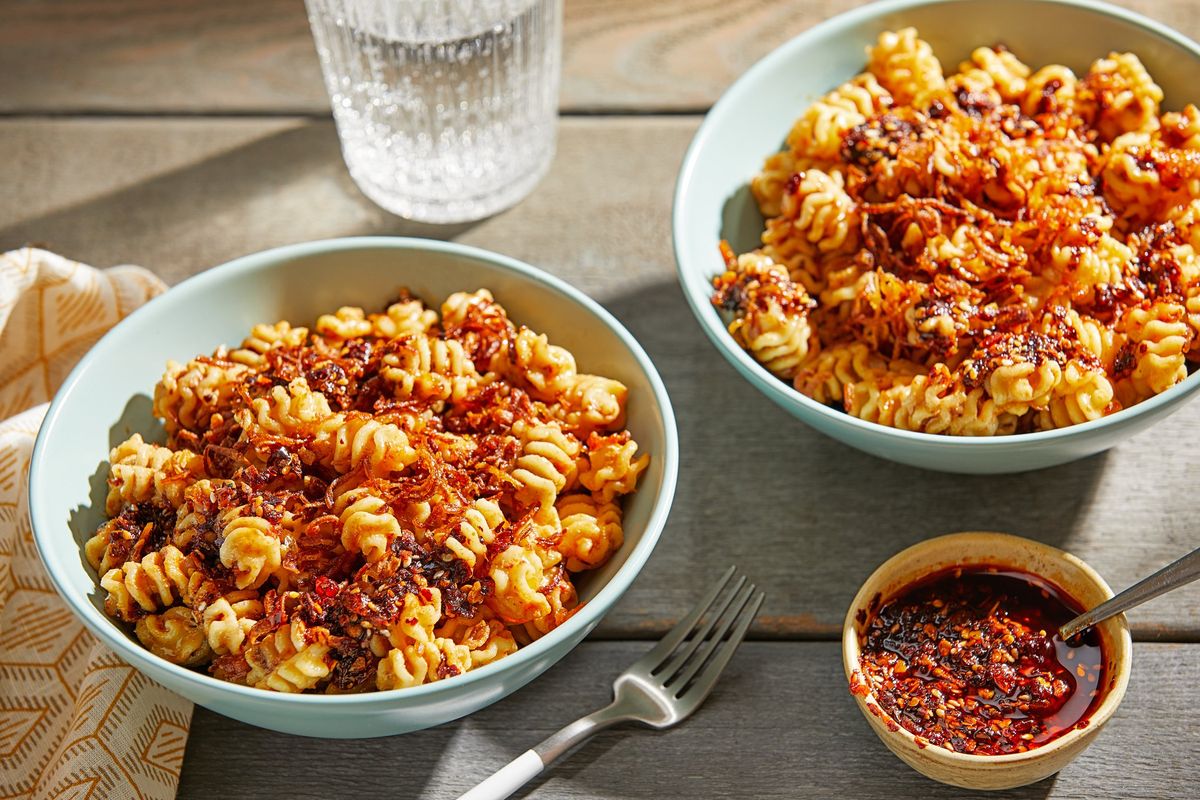 Chili Crisp Tahini Pasta With Fried Shallots, a recipe from “Anything’s Pastable” by Dan Pashman.  (Tom McCorkle for The Washington Post/food styling by Gina Nistico for The Washington Post)