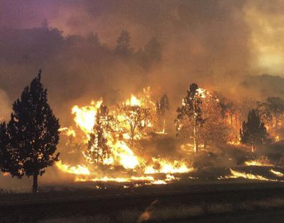 The Klamathon Fire burns Friday, July 6, 2018, in Hornbrook, Calif. A local California official says a deadly blaze burning near the Oregon border moved swiftly through the rural area that is home to many retirees. Siskiyou County Board of Supervisors chair Ray Haupt says the blaze moved so fast it quickly reached Hornbrook, a community of about 250 people about 14 miles south of the Oregon border. Authorities said one person was killed in the fire. (California Highway Patrol)