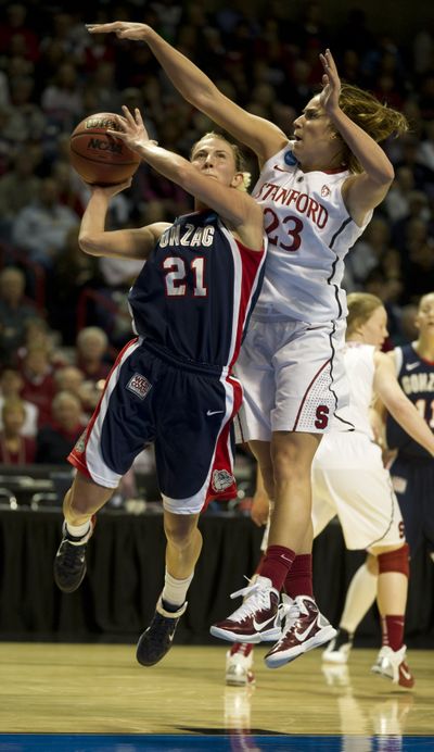 Gonzaga's Courtney Vandersloot, left, was named to the second team AP All-American team on Tuesday. Stanford's Jeanette Pohlen, right, made the first team.  (Colin Mulvany / The Spokesman-Review)
