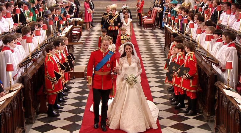 In this image taken from video, Britain's Prince William, left, and his wife, Kate, the Duchess  of Cambridge, walk down the aisle together at Westminster Abbey for the Royal Wedding in London on Friday, April, 29, 2011. (Aptn Sky)
