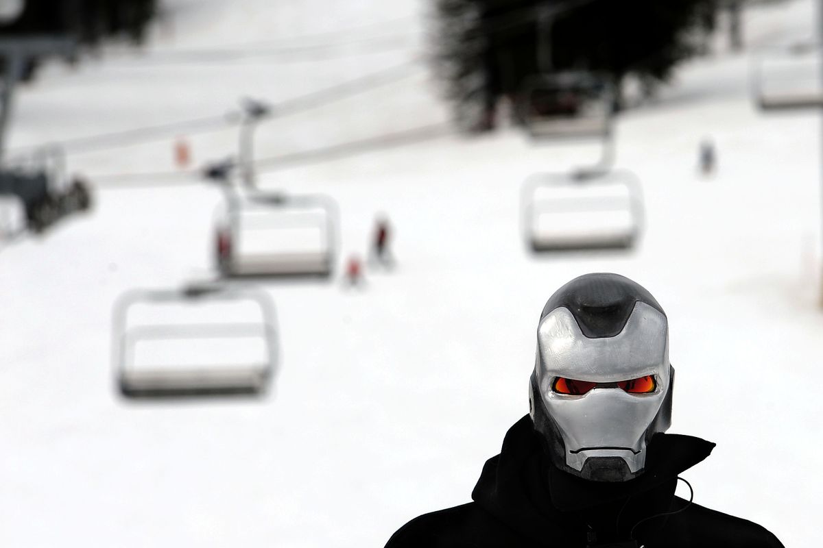 Coeur d’Alene resident Chris Moore decided to wear his Ironman mask while skiing at Schweitzer Mountain Resort on Thursday. (Kathy Plonka)