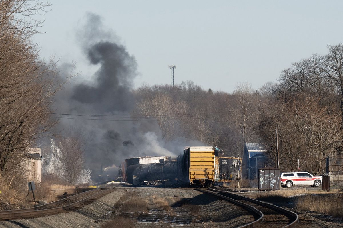 Smoke rises from a derailed cargo train in East Palestine, Ohio, on Feb. 4, 2023. (Dustin Franz/AFP/Getty Images North America/TNS)