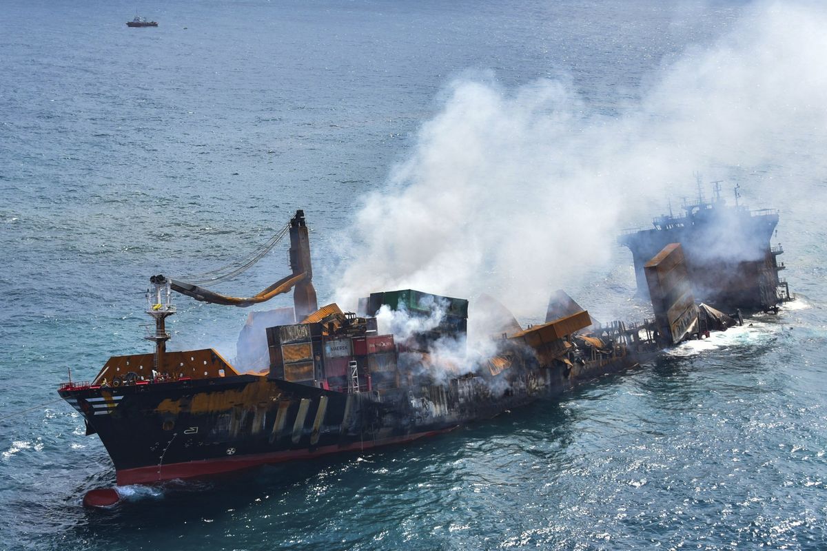 This photo provided by Sri Lankan Air Force shows the sinking MV X-Press Pearl at Kapungoda where it is anchored off Colombo port, Sri Lanka, Wednesday, June 2, 2021. Salvage experts were attempting to tow the fire-stricken container ship that had been loaded with chemicals into the deep sea as the vessel started to sink Wednesday. Water submerged the MV X-Press Pearl