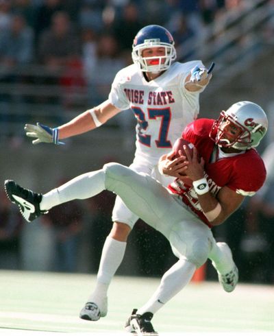 Shawn McWashington, foreground, will bring a player’s perspective to the Cougars broadcast booth. (File)