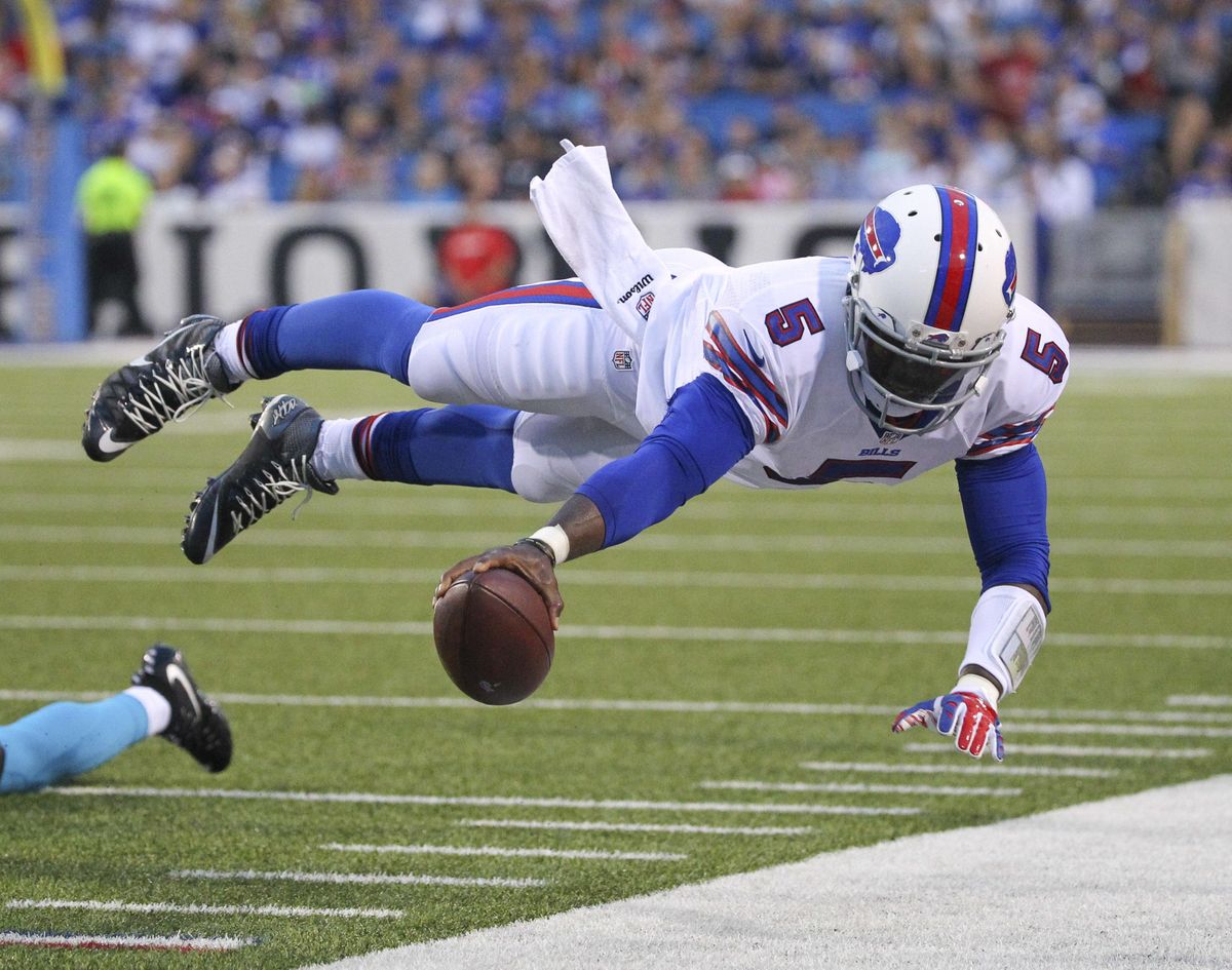 In this Aug. 15, 2015 file photo, Buffalo Bills quarterback Tyrod Taylor (5) dives for the first down marker during the first half of an NFL preseason football game against the Carolina Panthers in Orchard Park, N.Y. Two people familiar with the trade said Friday, March 9, 2018, the Cleveland Browns have agreed to acquire Taylor from the Bills for a third-round draft pick this year. (Bill Wippert / Associated Press)