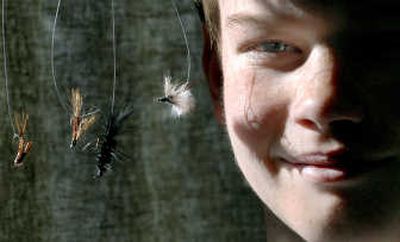 
Matthew Arndt, 11, of Post Falls, has taken his fly-tying hobby to the next step and is now selling his creations. 
 (Kathy Plonka / The Spokesman-Review)