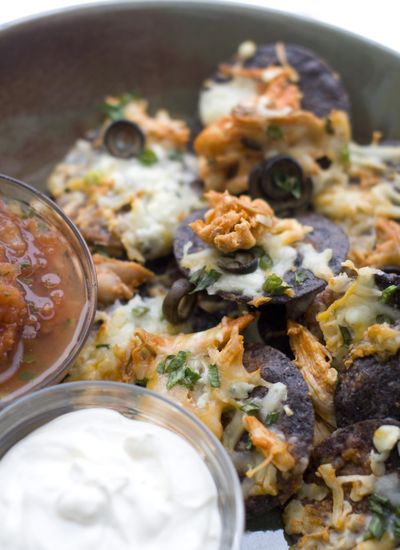 Buffalo chicken nachos offer a mega mashup fit for the Super Bowl. (Associated Press)