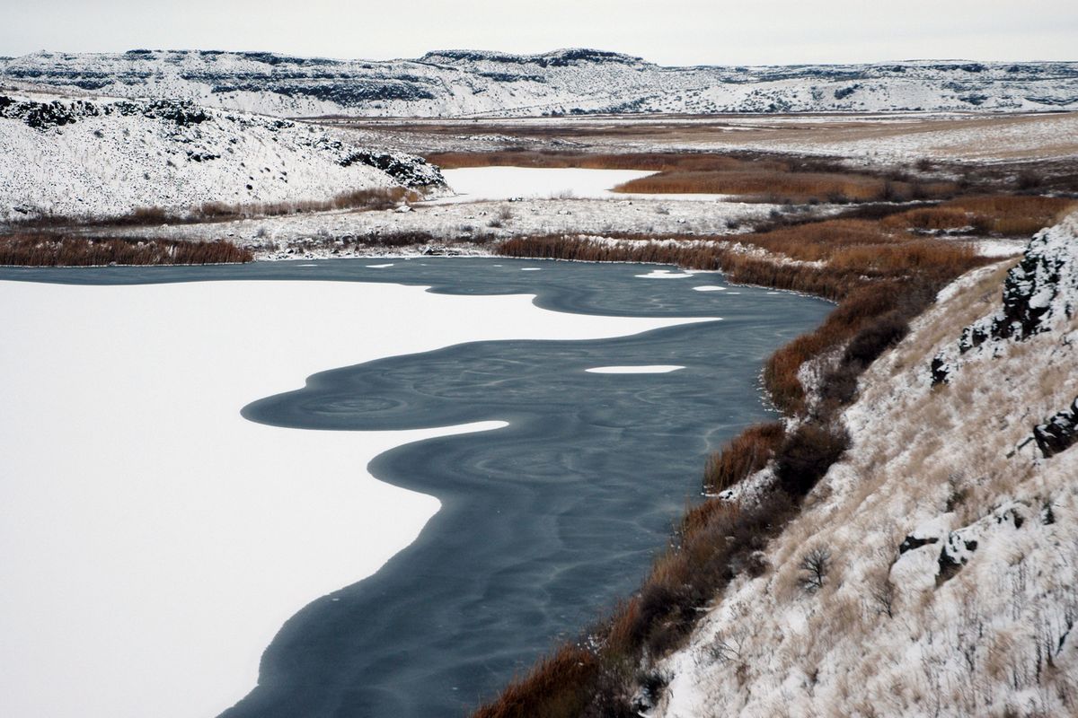 Chukar Lake in the Columbia National Wildlife Refuge south of Potholes Reservoir is in a frozen Central Washington scablands landscape worthy of discovery by hikers.  (TERRY RICHARD)