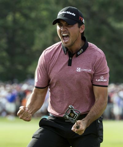 Jason Day celebrates after a birdie putt on No. 18 Sunday capped his Canadian Open win. (Associated Press)