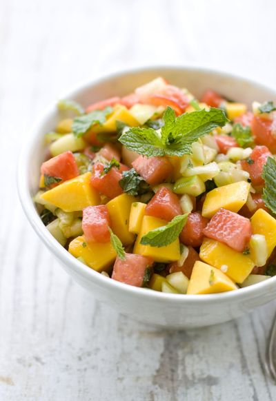 Cucumber, Watermelon and Mango Salad is from Arthur Potts Dawson’s new cookbook, “Eat Your Vegetables.” (Associated Press)