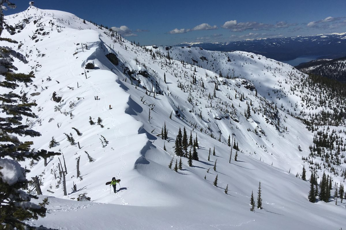 Jason Keen (front) and Aaron Theisen boot pack a ridgeline on Sundance Mountain on April 19. (Mike Brede / Courtesy)