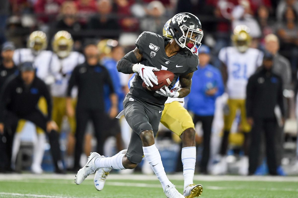 Washington State Cougars wide receiver Davontavean Martin (1) runs the ball against the UCLA Bruins during the first half of a college football game on Saturday, September 21, 2019, at Martin Stadium in Pullman, Wash. (Tyler Tjomsland / The Spokesman-Review)